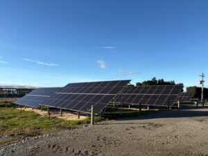 Solar panels installed by a dairy farm shed in Waitaki Valley